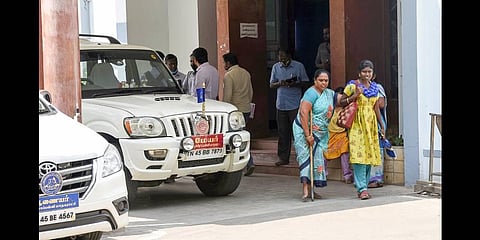 A disabled woman leaving the Corporation main office building in Tiruchy | MK Ashok Kumar