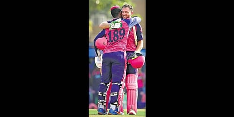 Jos Buttler of Rajasthan Royals celebrates his century with teammate Shimron Hetmyer at the DY Patil Stadium in Navi Mumbai on Saturday | SPORTZPICS