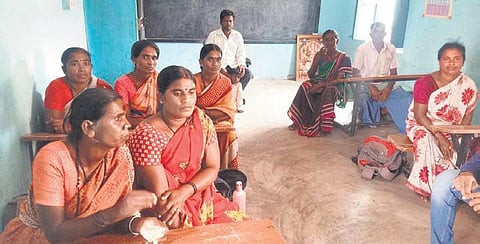 The group of women who cleared the feeder canals of the two lakes in a village  in Kolar district. (Photo| EPS)