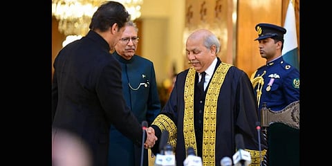 Pakistan's former chief justice Gulzar Ahmed(R) with Imran Khan (L).(Photo | Facebook, Imran Khan)