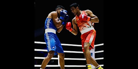 India's  Ashish Kumar (R) defeated Maikhel Roberrd Muskita of Indonesia (L) in the men's 81kg semifinal bout.(Photo | BFI)