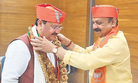 Chief Minister Basavaraj Bommai greets BJP National President J P Nadda at the BJP headquarters in New Delhi on Wednesday | SPECIAL ARRANGEMENT