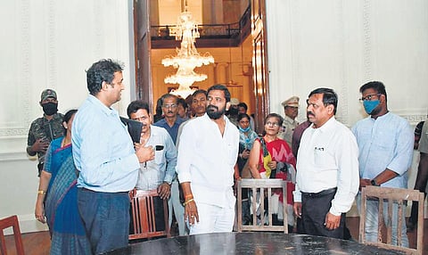 Tourism Minister V Srinivas Goud chats with officials after inaugurating the renovated British Residency to the University College for Women, Hyderabad. (Photo| EPS)