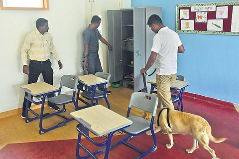 The bomb disposal and dog squads conduct a search at Redbridge  International School after many educational institutions across Bengaluru  received bomb threats on Friday | Ashishkrishna HP