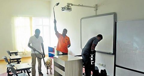 Members of the bomb detection squad conduct a search on the premises of Redbridge International School | Ashishkrishna HP