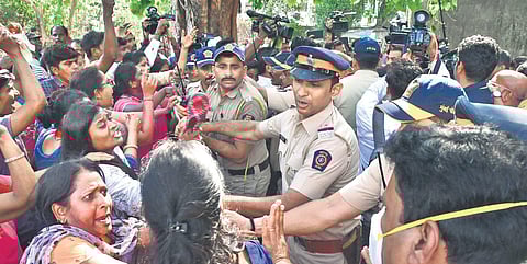 Police personnel in a scuffle with MSRTC employees outside the residence of Sharad Pawar in Mumbai on Friday | PTI