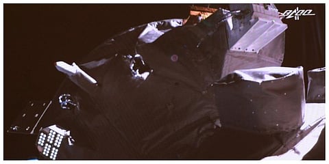 A Tianzhou-4 spacecraft docks with China's under-construction space station, as seen on a video screen at the Beijing Aerospace Control Center in Beijing, Tuesday, May 10, 2022. (Photpo |AP)