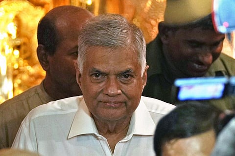 Sri Lanka's new prime minister Ranil Wickremesinghe arrives at a Buddhist temple in Colombo, Sri Lanka, Thursday, May 12, 2022.(Photo | AP)