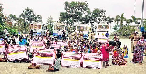 Fishers from Kattupalli Kuppam staging a protest alleging that the L&T Shipbuilding failed to provide permanent jobs to 140 families of the village | Express