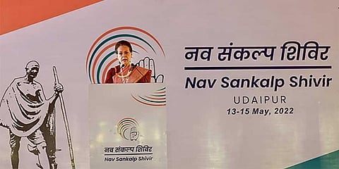 Congress president Sonia Gandhi addressing delegates at the chintan shivir in Udaipur on Friday. Mark the faux pas on the Dandi march picture on the backdrop. It is in reverse. (PTI)
