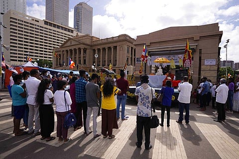Protesters demanding Sri Lankan President Gotabaya Rajapaksa resign perform a religious observance to mark Buddha Poornima or Vesak. (Photo | AP)