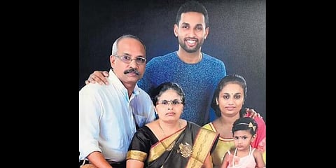 H S Prannoy with his family members