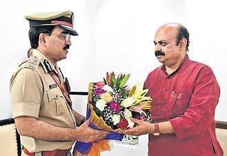 CM Basavaraj Bommai greets the new city police commissioner Pratap Reddy