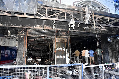 The charred hardware shop in Adambakkam after fire and rescue services personnel doused a major fire which broke out there on Sunday. (Photo | Ashwin Prasath, EPS)