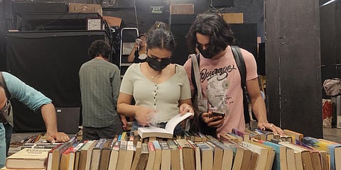 Visitors browsing through books at the May Day Bookstore sale in New Delhi. (Photo| Anjani Chadha, EPS)
