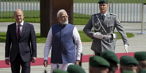 German Chancellor Scholz, on carpet left PM Modi with military honors for a meeting at the chancellery in Berlin, May 2 2022 (Photo | AP)