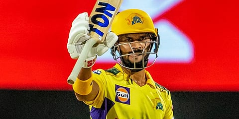 Ruturaj Gaikwad of Chennai Super Kings raises his bat after scoring a half century, during the IPL match against Sunrisers Hyderabad at the MCA International Stadium in Pune. (Photo | PTI)