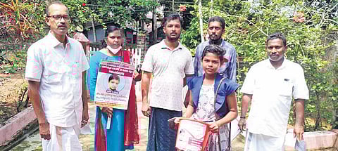 Members of Athirampuzha Jeevan Raksha Samithi along with panchayat president Biju Valiyamala during the fund collection drive. ( Photo | EPS)
