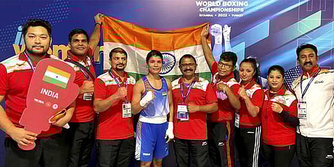 Indian boxer Nikhat Zareen with coaches after winning Women's World Championship match against Thailand's Jitpong Jutamas in the flyweight (52kg) final, in Istanbul on Thursday, May 19, 2022. (PTI)