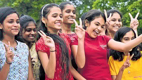 Students celebrate after SSLC results were announced in Bengaluru on Thursday 