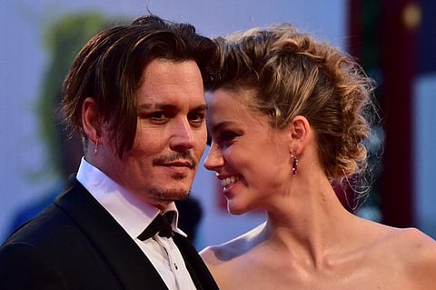 In an op-ed for the Washington Post in 2018, Heard wrote, identifying herself as a survivor of violence. Depp sued Heard for defamation, and she sued back, and now their trial is underway in Virginia’s Fairfax County Circuit Court.  (Photo | AFP)