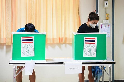 Thai people cast their ballots in Bangkok's gubernatorial election at a polling station in Bangkok, Thailand. ( Photo | AP)