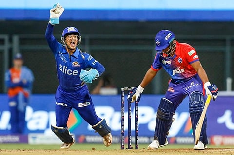 Ishan Kishan of Mumbai Indians takes the catch of Sarfaraz Khan of Delhi Capitals, during the Indian Premier League 2022 cricket match between Mumbai Indians and Delhi Capitals. (Photo | PTI)