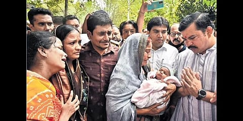 BJP MLA T Raja Singh meets the family members and the wife of the victim Neeraj Panwar. (Photo| Express,Vinay Madapu)