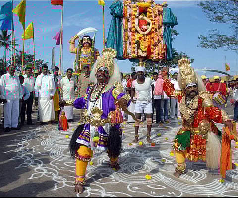 File photo of folk artists perform at Chamundi Hills during the inauguration of Dasara celebrations in Mysore. EPS