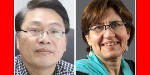 Climate scientists Valerie Masson-Delmotte (R) and Panmao Zhai