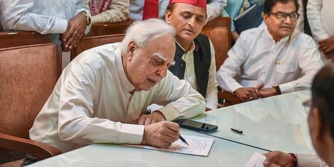 Former Congress leader Kapil Sibal files his nomination papers for Rajya Sabha. (Photo | PTI)