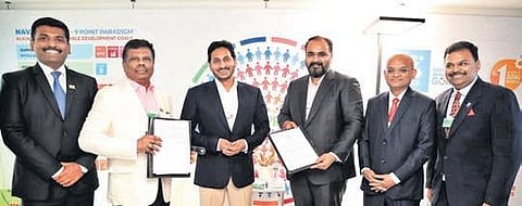 CM Jagan Mohan Reddy with industrialists at the AP Pavilion in Davos | express