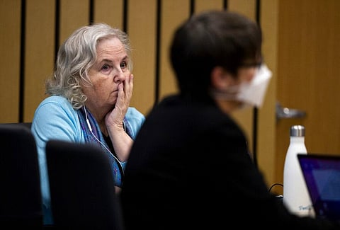Romance writer Nancy Crampton Brophy, left, accused of killing her husband, Dan Brophy, in June 2018, watches proceedings in court in Portland. (Photo | AP)