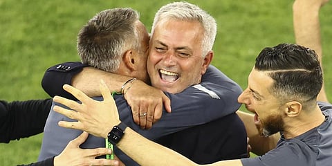 Roma's coach Jose Mourinho, center, celebrates at the end of the Europa Conference League final soccer match between AS Roma and Feyenoord.(Photo | AP)