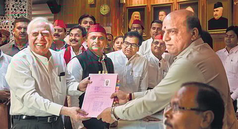 Kapil Sibal files nomination papers for Rajya Sabha in Lucknow in the presence of SP chief Akhilesh Yadav | PTI