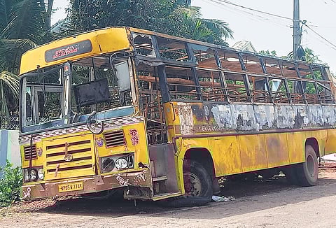 A bus set on fire by protesters at the Collectorate in Amalapuram | Express