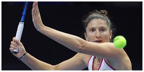 Irina-Camelia Begu of Romania returns the ball to Maria Sakkari of Greece during the St. Petersburg Ladies Trophy tennis tournament semi-final match in St.Petersburg, Russia, Saturday, Feb. 12, 2022.