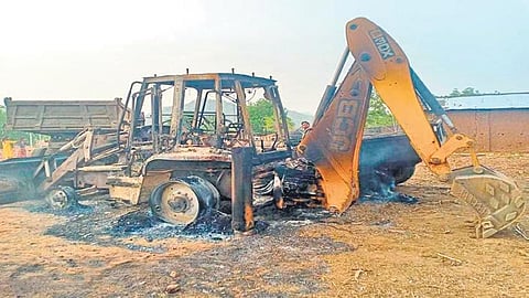 Charred vehicles at the contractor’s camp near Tal Pipili village | Express