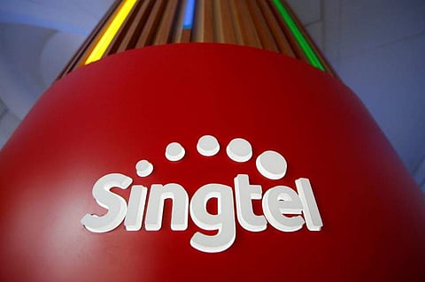 A Singtel logo is pictured at their head office in Singapore. Reuters