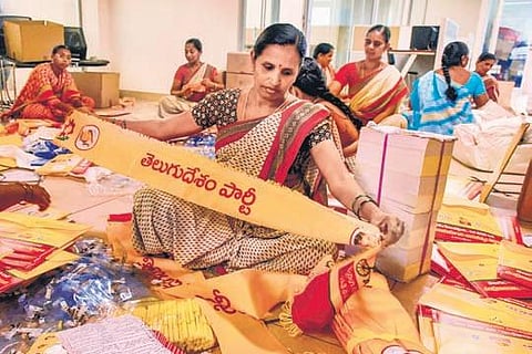 Women pack material to be given to TDP activists at Mahanadu at the party central office in Mangalagiri on Thursday | Prasant Madugula