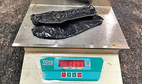 Gold in packets concealed inside shoes