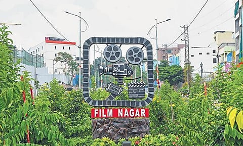 Sculptures depicting scenes from movies and equipment used in cinema making adorn the median in Film Nagar, Hyderabad | RVK Rao