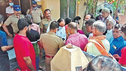 Police inquring at the house in Pallavaram, where a 40-year-old man killed his wife and two children before dying by suicide | Express