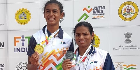 Indian athletes Priya H Mohan (L) and Dutee Chand
