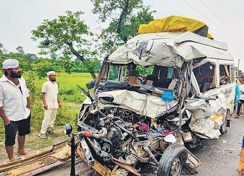 The mangled remains of the van that collided with a truck in Bahraich district of Uttar Pradesh on Sunday morning. Eight people were injured. (Photo| EPS)