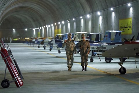 Chief of the General Staff of the Armed Forces Gen. Mohammad Hossein Bagheri, left, and Commander of the Army Gen. Abdolrahim Mousavi visit an underground drone base. (Photo | AP)