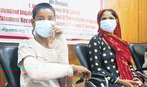 Shubham with his mother during a press conference in New Delhi | Shekhar Yadav