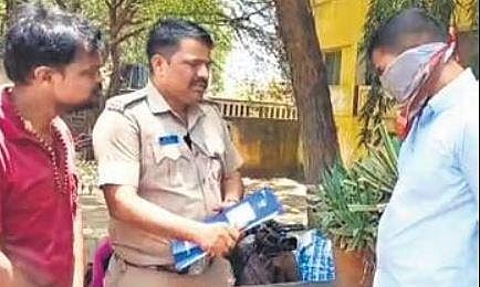 The accused Prabhu shows police the place where he had hid the Bluetooth device 