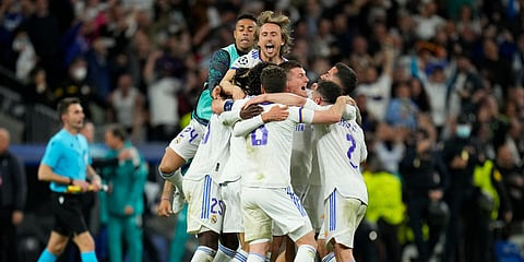 Real Madrid players celebrate at the end of the Champions League semifinal against Manchester City at the Santiago Bernabeu stadium in Madrid. (Photo| AP)