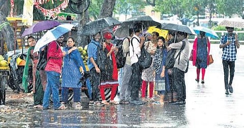 Rains bring much-needed respite to people in Vizag on Wednesday. (Photo | G Satyanarayana, EPS)